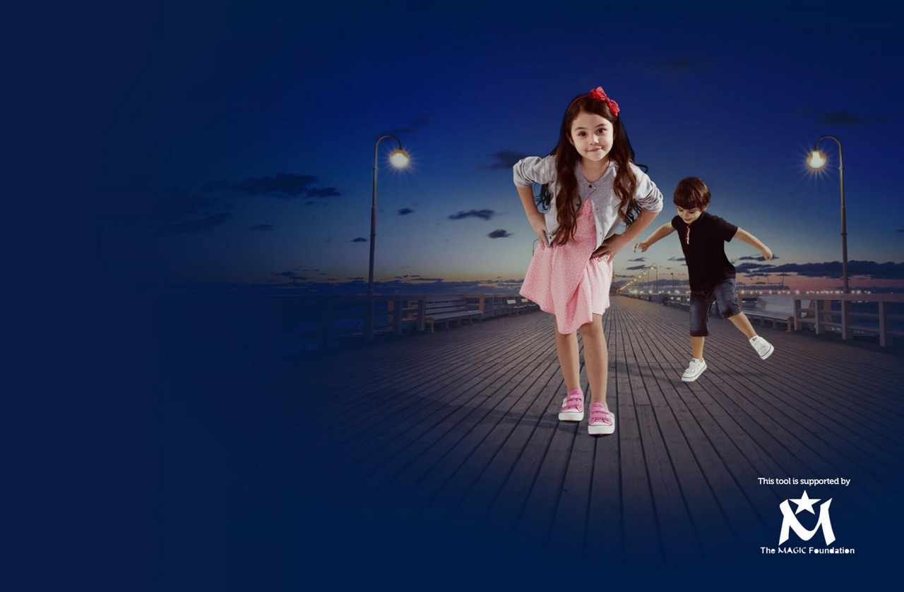 Girl and boy on boardwalk